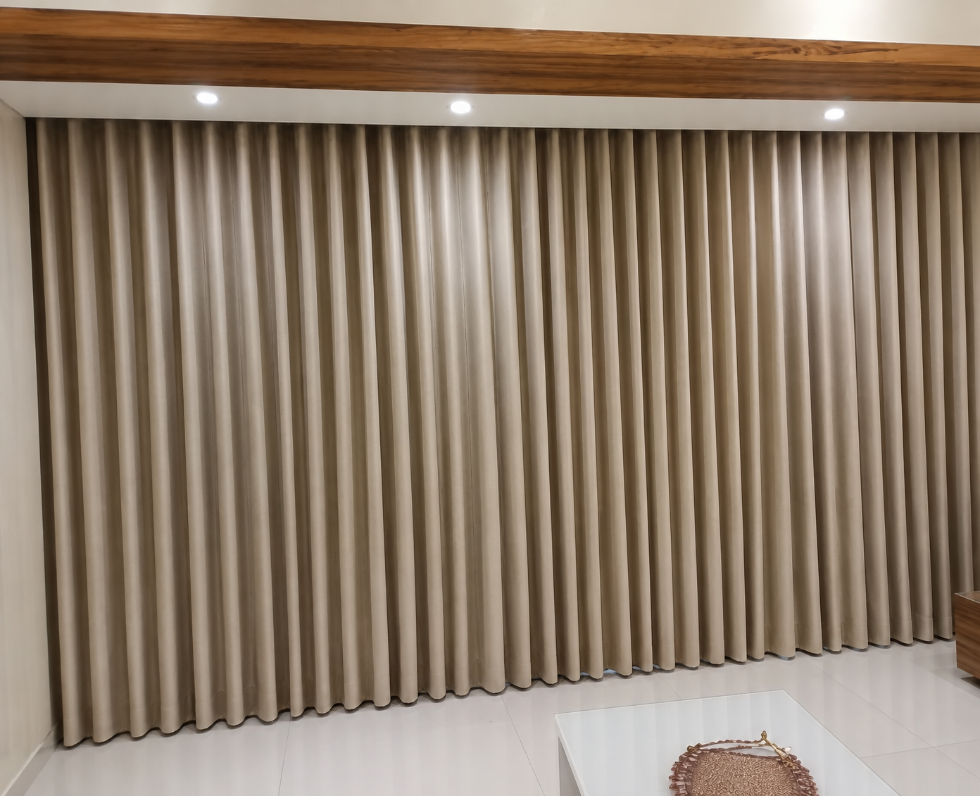 Beige wave fold curtains full wall - ARA Decor Studio Pune